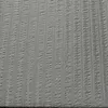 A close-up view of a gray seersucker fabric with a textured, striped pattern. Produktbild-Vorschau