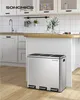 A modern kitchen with white cabinets and a stainless steel trash can. Náhľad obrázku produktu
