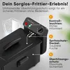 A close-up marketing image of a black deep fryer with text overlays highlighting its features. Produktbild-Vorschau