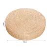 A round, woven straw cushion is shown from a top-down perspective against a white background. Dimensions are indicated by measurement lines and text. Produktbild-Vorschau