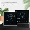 Two digital thermostats are displayed on a dark surface, with a potted plant in the background. Podgląd zdjęcia produktu