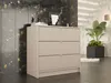 A modern dresser with fluted drawers is placed in a stylish room with a dark, textured wall and a white brick wall in the background. A large potted plant adds a touch of greenery. Náhľad obrázku produktu