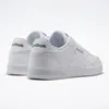 A pair of white Reebok sneakers shown from a rear-diagonal angle against a white background. Produktbild-Vorschau