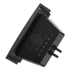 A black electronic device, likely a charger or adapter, is shown at an angle against a black background. Text and regulatory symbols are visible on the product's surface. Voir les images du produit
