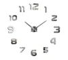 A modern wall clock with reflective numbers and hands on a white background. Produktbild-Vorschau