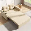A beige sofa bed is shown in an extended position, revealing its bed functionality. It is placed in a room with wooden flooring and a window in the background. Produktbild-Vorschau