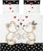 A bedding set featuring two teddy bears kissing, surrounded by hearts. Produktbild-Vorschau