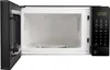 An open microwave oven with its interior visible. Anteprima dell’immagine prodotto