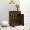 A shoe cabinet with its doors open, displaying shoes on shelves, next to a small white stool and a patterned rug. Produktbild-Vorschau