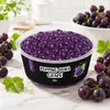 Schwarze Schale gefuellt mit Popping Boba Perlen Traube in Nahaufnahme Podgląd zdjęcia produktu