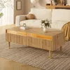 A living room scene with a couch and coffee table. Produktbild-Vorschau