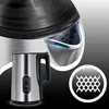 A close-up collage of a stainless steel electric kettle, highlighting its interior features and digital display. Produktbild-Vorschau