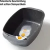 A gray roasting pan with a speckled interior, showing two fried eggs on a piece of paper inside. Produktbild-Vorschau