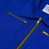 Close-up of a blue garment with zippers. Produktbild-Vorschau