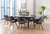 A dining room scene with a table and chairs. Produktbild-Vorschau