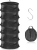 A black, multi-tiered drying rack with a hook and a folded carrying bag. Produktbild-Vorschau