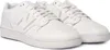 A pair of white New Balance sneakers. Podgląd zdjęcia produktu