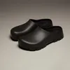 A pair of black Birkenstock Super Birki 2.0 Polyurethane clogs are displayed on a plain gray background. Produktbild-Vorschau