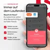 A hand holding a smartphone displaying a smart home app with a fire alarm notification. Produktbild-Vorschau