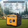 A portable generator is shown in a natural outdoor setting with a tent and RV in the background, surrounded by mountains and trees. Podgląd zdjęcia produktu