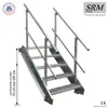 A metal staircase with handrails against a white background. Anteprima dell’immagine prodotto