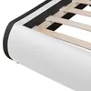 Close-up of a white upholstered bed frame with wooden slats. Náhled obrázku produktu