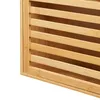 A close-up view of a slatted bamboo cabinet door. Anteprima dell’immagine prodotto