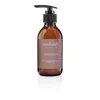A brown pump bottle of body lotion on a white background. Produktbild-Vorschau