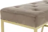 Close-up of a tufted bench cushion with a gold metal frame. Produktbild-Vorschau