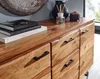 A close-up view of a wooden sideboard with drawers and doors, showcasing its natural wood grain and black handles. Produktbild-Vorschau