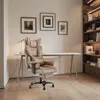 A well-lit office or study room with a desk, chair, and bookshelf. Voir les images du produit