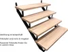 A set of wooden stairs with black metal supports against a white background. Podgląd zdjęcia produktu