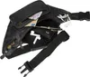 A black leather fanny pack is shown with its contents spilling out. Voir les images du produit