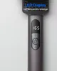 A close-up view of the handle of a hair straightening brush, showing the LED display and control buttons. Produktbild-Vorschau