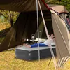 A woman relaxing on an inflatable mattress inside a tent. Náhľad obrázku produktu