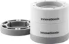 A product shot of two white and gray anti-vibration feet for appliances, with a separate gray base shown to the left. Anteprima dell’immagine prodotto