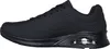 A side view of a black sneaker. Voir les images du produit