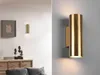 A split image showing a wall lamp in a room setting and a close-up of the lamp. Produktbild-Vorschau