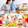 A collage showing a family preparing food in a kitchen and children at a birthday party with a fruit stand. Produktbild-Vorschau
