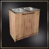 A kitchen cabinet with a double sink and chrome faucets, set against a black background with a decorative border. Produktbild-Vorschau