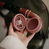PETITE&MARS Pouzdro silikonové na dudlík  Intense Ochre 0m+ Náhled obrázku produktu 2