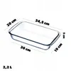 A clear, well-lit studio shot of a rectangular glass baking dish with dimensions indicated by text overlays. Podgląd zdjęcia produktu