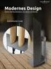 A modern fireplace tool set with wooden handles displayed on a wooden floor. Produktbild-Vorschau