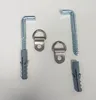 A collection of picture hanging hardware, including L-shaped screws with wall anchors and D-rings. Produktbild-Vorschau