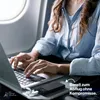 A person using a laptop and a power bank on an airplane. Produktbild-Vorschau