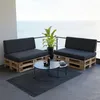 A balcony overlooking the ocean with pallet furniture and coffee tables. Produktbild-Vorschau