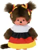 A Monchhichi doll wearing a dress with the German flag colors and bows in its hair. Náhled obrázku produktu