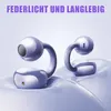 Two futuristic-looking purple clip-on headphones are displayed on a wavy, light purple surface against a light gray background. Produktbild-Vorschau