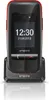 A black and red Emporia ONE V200i mobile phone is shown in its charging dock against a white background. Podgląd zdjęcia produktu