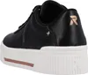 A close-up side view of a black sneaker with a white platform sole. Náhled obrázku produktu